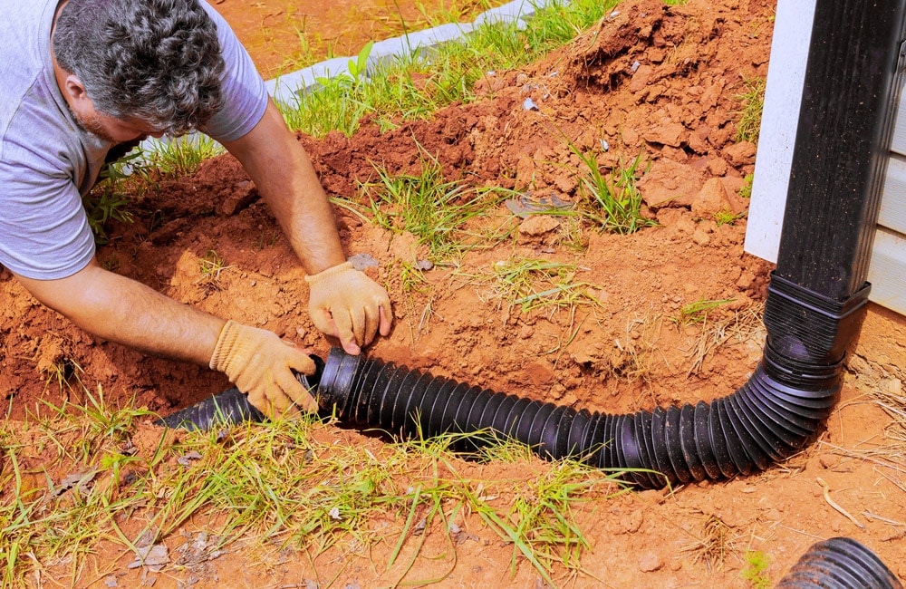 What Are The Benefits Of Installing Downspout Drainage Systems?