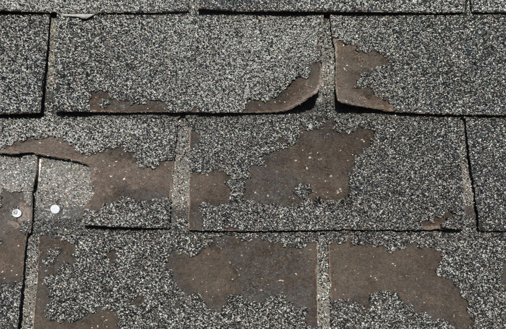 What Causes Roof Shingles To Curl, Crack, or Cup?