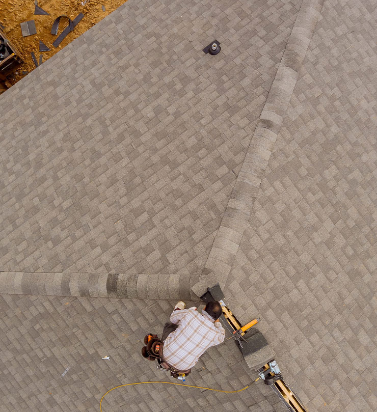 Roofer Repairing Hail Damage